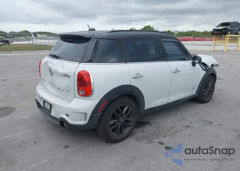 2013 Mini Countryman Cooper S z USA, uszkodzony, nr VIN WMWZC5C58DWP33951